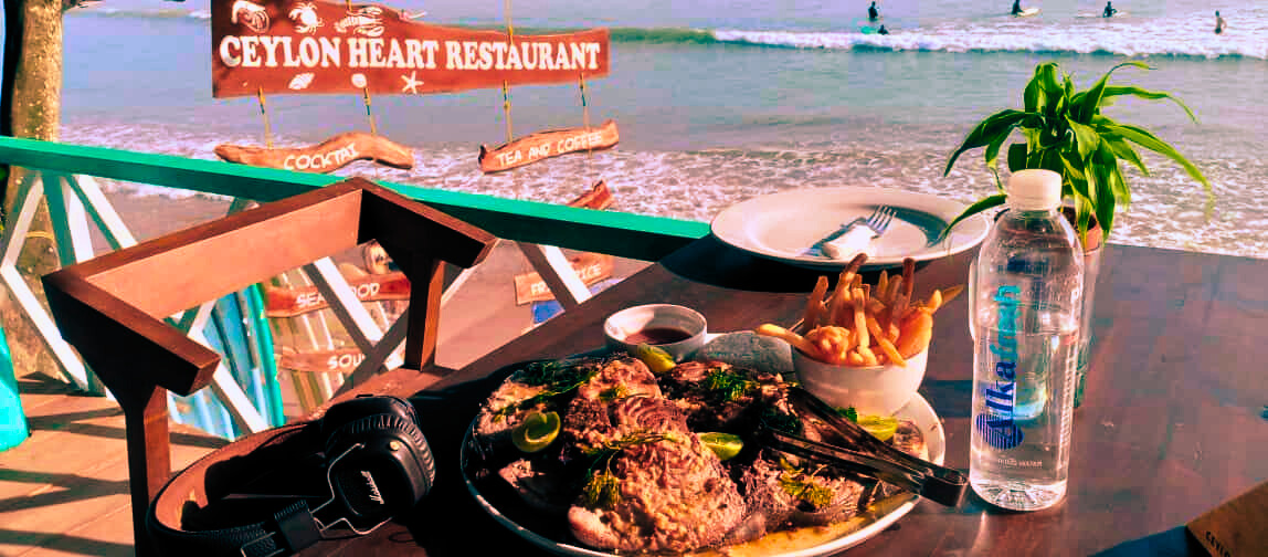 Beachfront dining at sunset